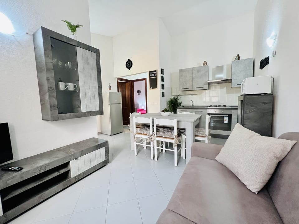 Apartment, 2 Bedrooms | Living area | Flat-screen TV