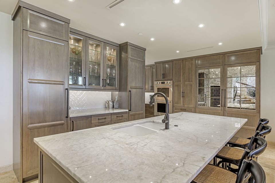 Wine Fridge, ice maker/center Beverage fridge on right great entertainment space