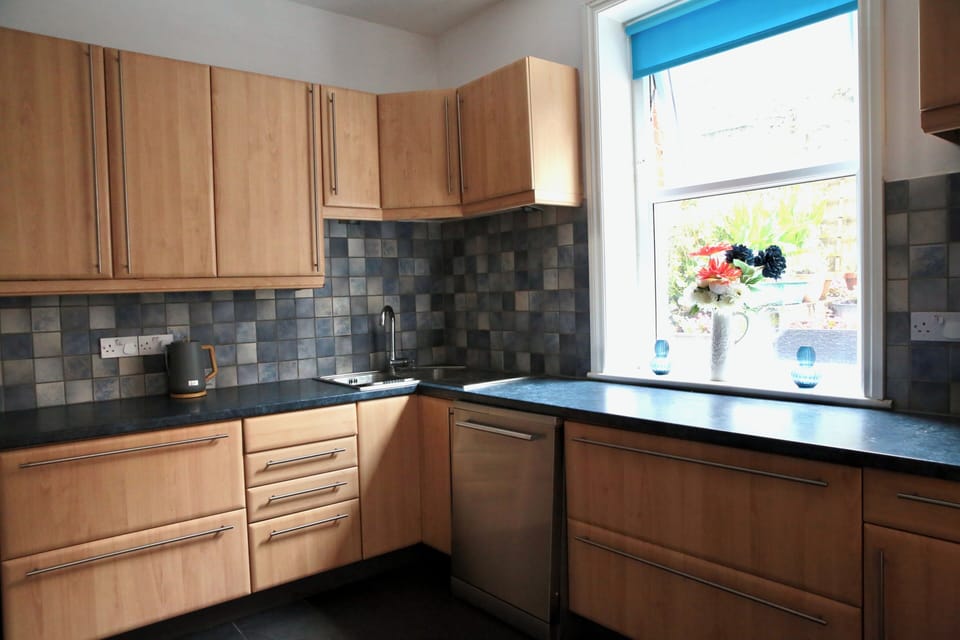 Family House, Multiple Beds, Partial Ocean View, Courtyard Area | Private kitchen | Full-size fridge, microwave, oven, stovetop