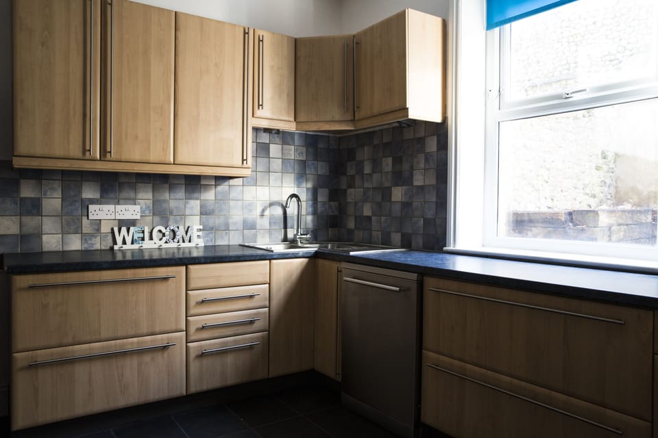 Family House, Multiple Beds, Partial Ocean View, Courtyard Area | Private kitchen | Full-size fridge, microwave, oven, stovetop