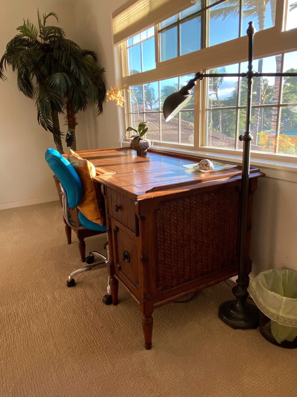 Desk in loft faces a beautiful view of Mauna Kea