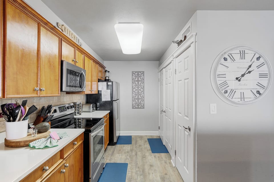 Fully stocked kitchen provides every appliance, opener, or utensil you may need