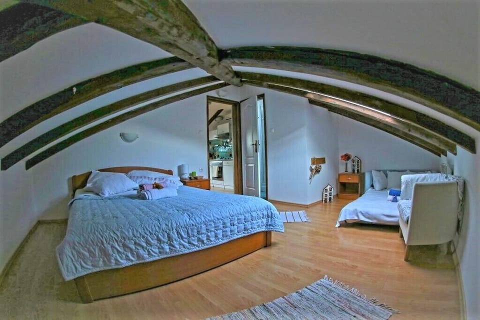 Family Room (Attic) | In-room safe, free WiFi, bed sheets