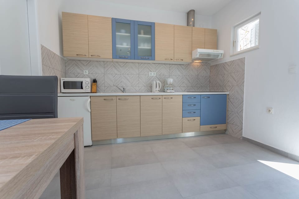 Superior Apartment | Private kitchen | Fridge, electric kettle