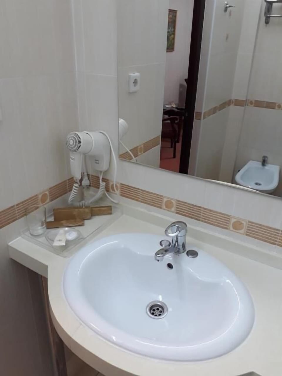Shower, slippers, bidet, towels