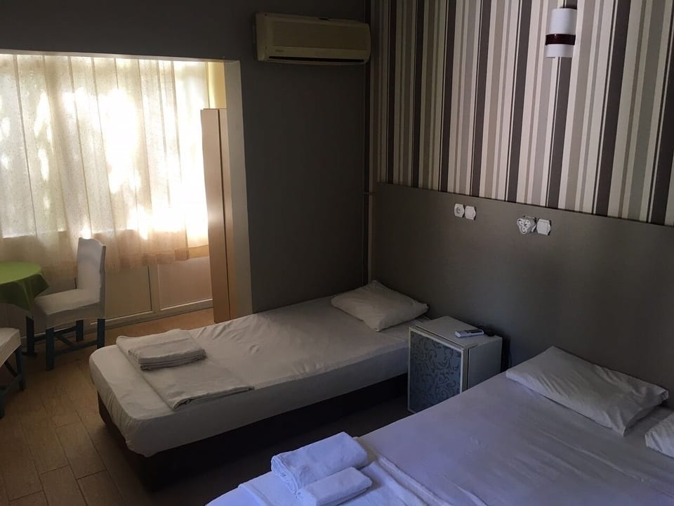 Triple Room, Garden View | Premium bedding, desk, bed sheets