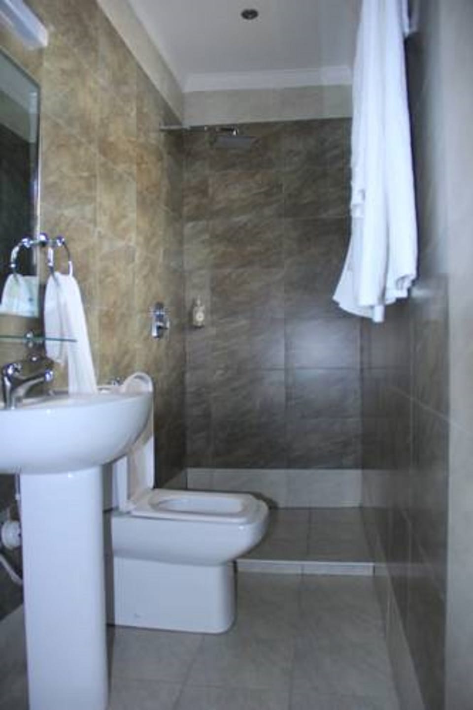 Basic Double Room | Bathroom | Shower, towels, soap, toilet paper
