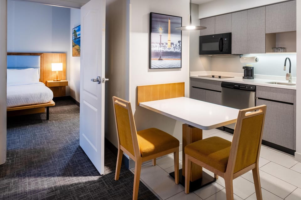 Suite, 1 Bedroom | Private kitchen | Fridge, microwave, stovetop, dishwasher