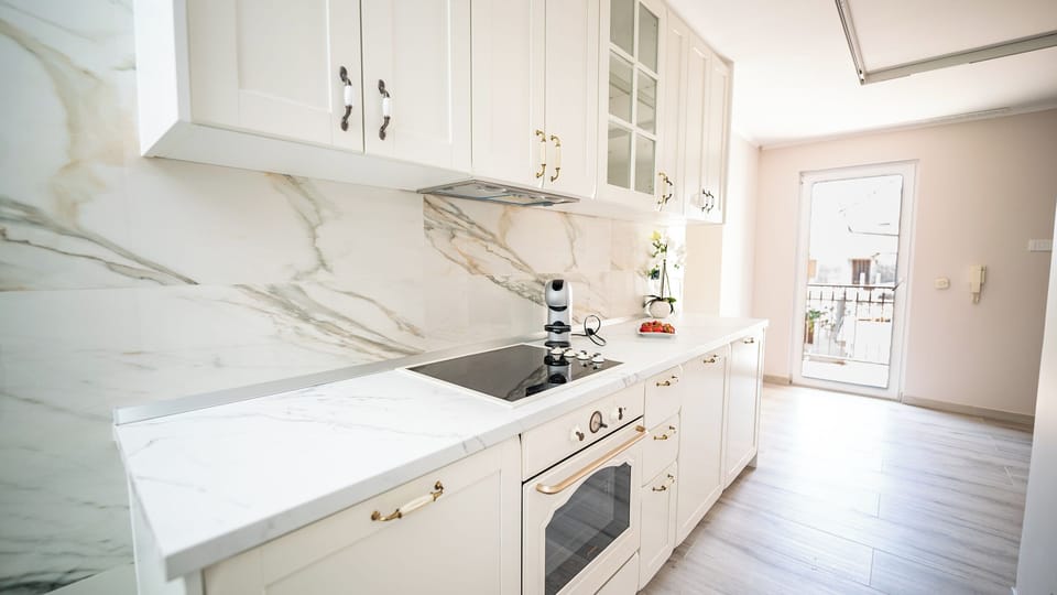 Two bedroom apartment | Private kitchen | Full-size fridge, microwave, electric kettle