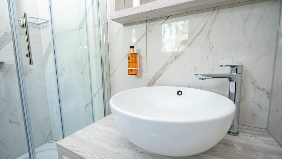 Shower, free toiletries, hair dryer, bathrobes