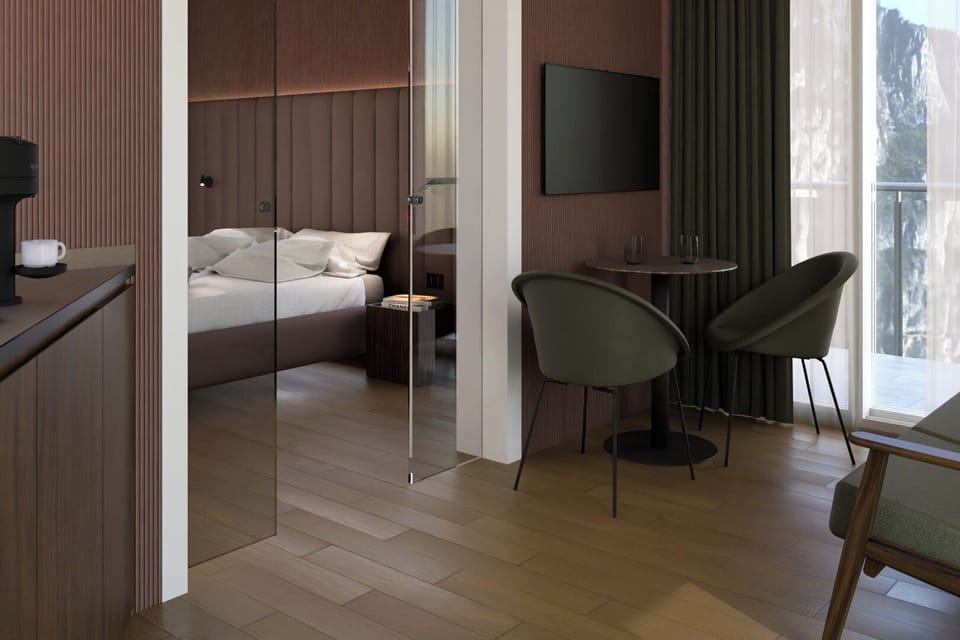 Suite, Balcony | Minibar, in-room safe, individually furnished, desk