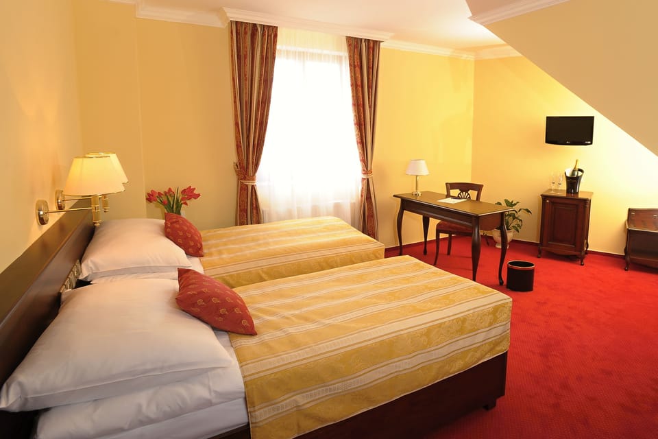 Standard Quadruple Room, 2 Bedrooms, Non Smoking | Minibar, in-room safe, desk, blackout drapes