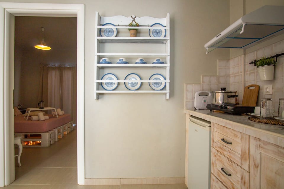 Superior Triple One Bedroom Apartment | Private kitchenette | Coffee/tea maker, mini-fridge, stovetop, electric kettle