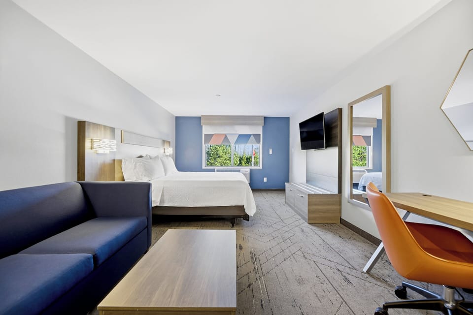 Down comforters, pillowtop beds, in-room safe, desk