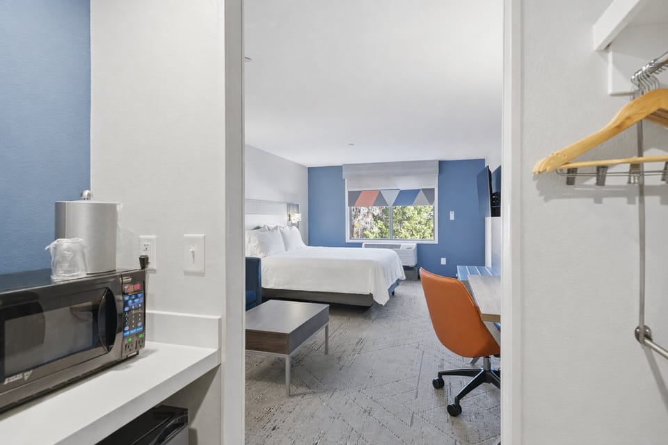 Down comforters, pillowtop beds, in-room safe, desk