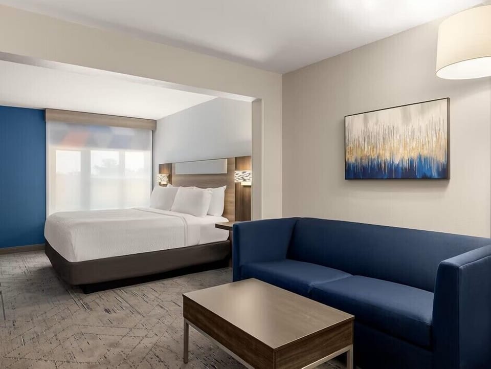 Down comforters, pillowtop beds, in-room safe, desk