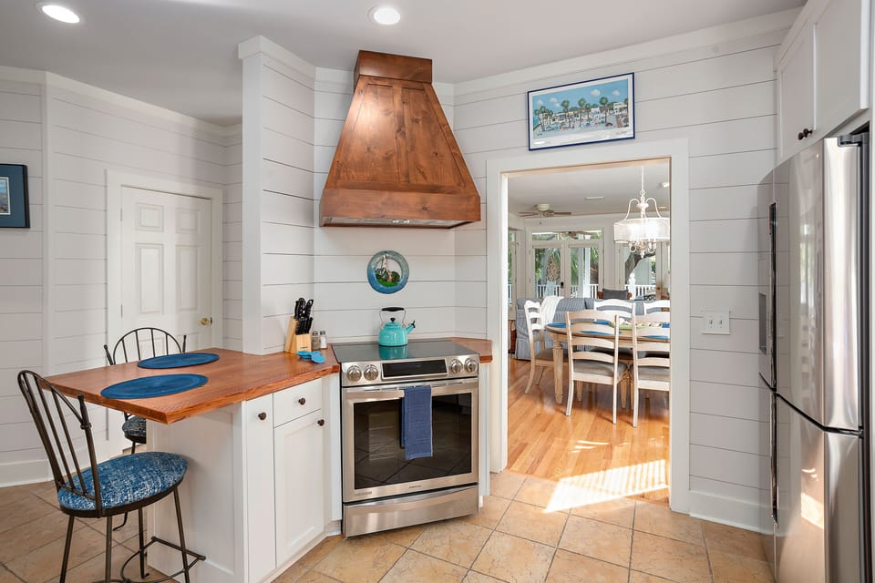 Chef's Kitchen with high-end stainless steel appliances