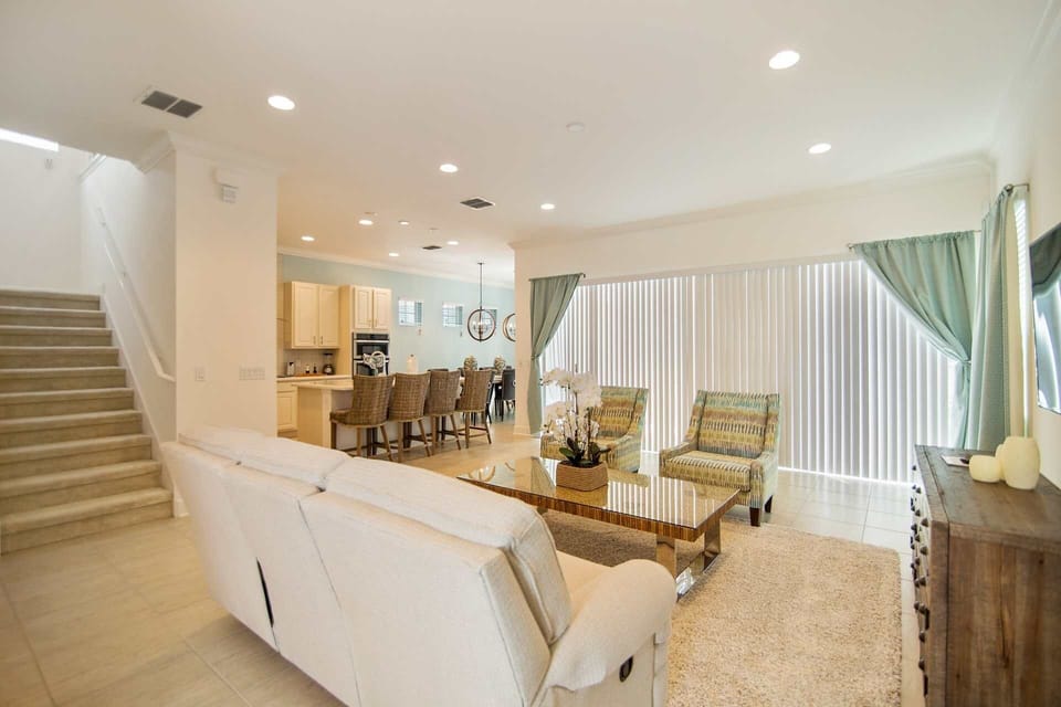 Beautiful Open Floor Plan Living Area, Dining Area, Kitchen and Pool Access