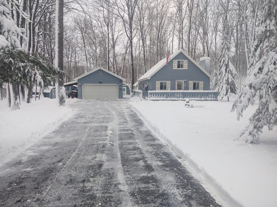 Driveway space for two trucks and toy trailer. Always clear upon arrival