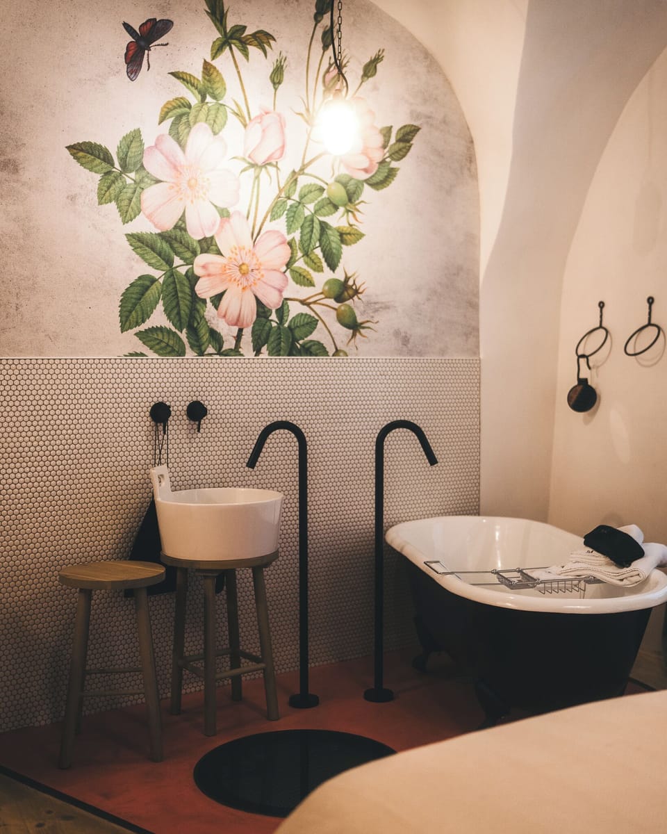 Deluxe Room | Bathroom | Designer toiletries, hair dryer, towels, soap