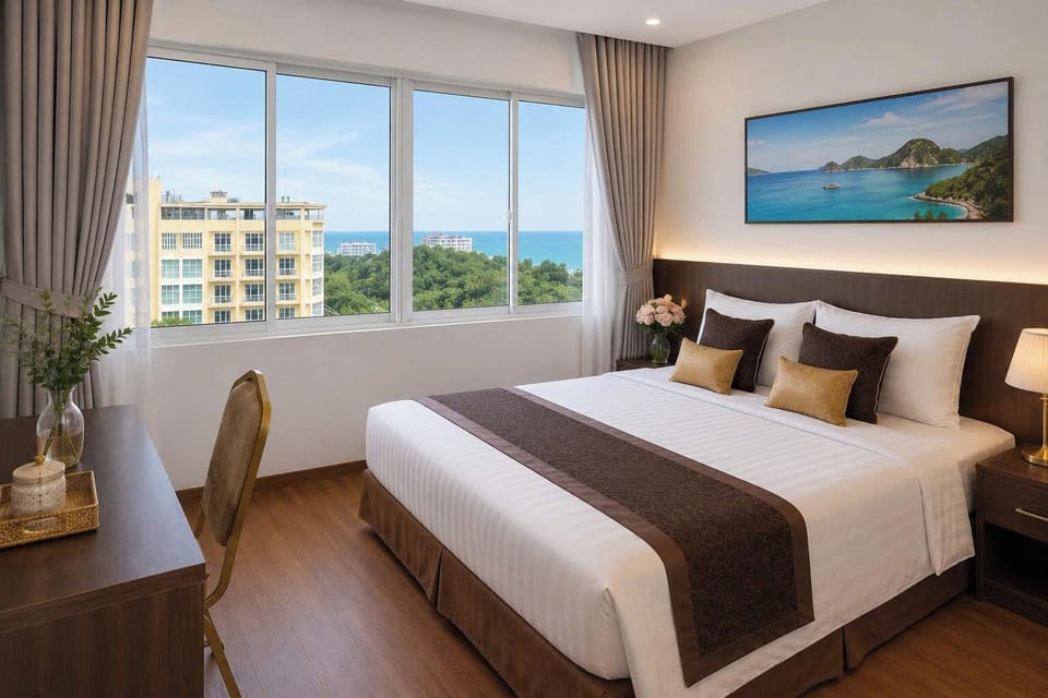Deluxe Double Room | Minibar, desk, laptop workspace, blackout drapes