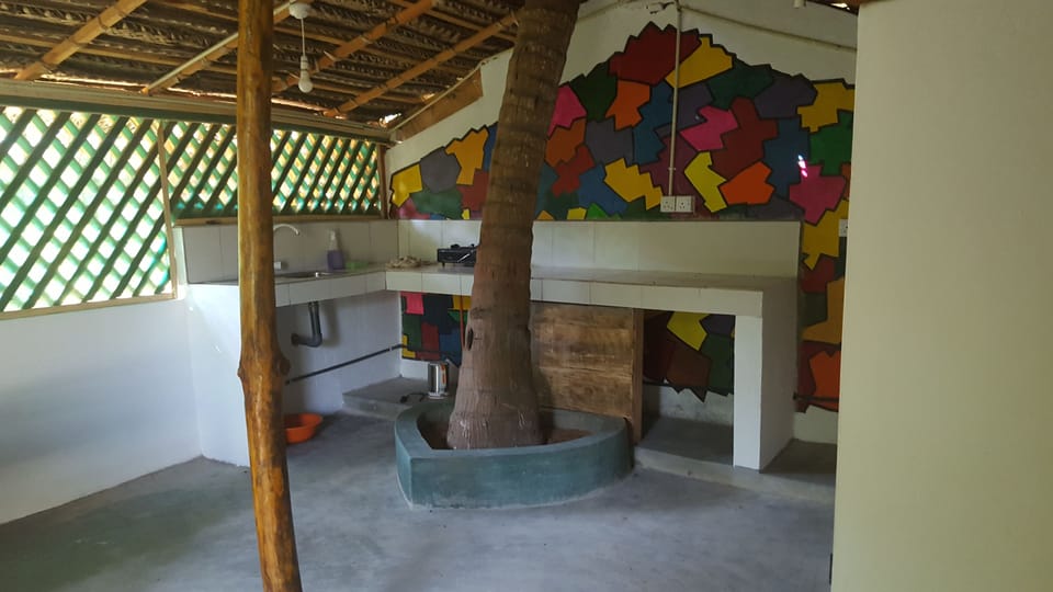 Family Triple Room, Garden View | Private kitchen