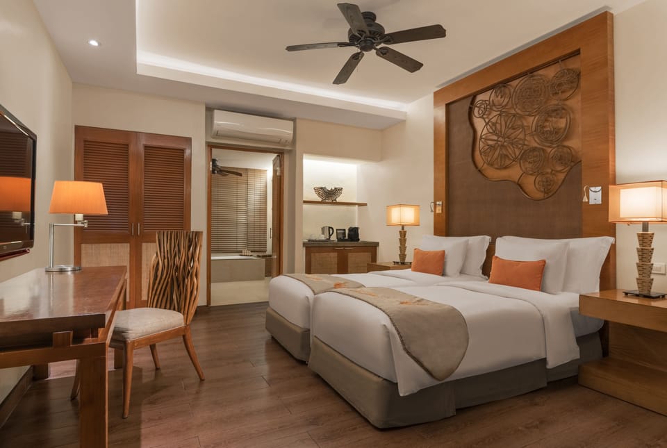 Deluxe Room, Garden View | Premium bedding, down comforters, pillowtop beds, in-room safe