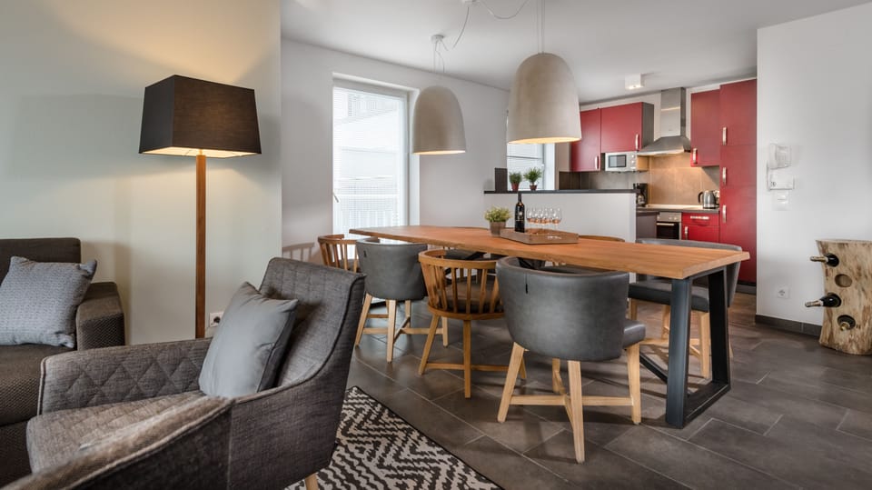Apartment, Balcony, Mountain View (Alpine Dreams) | Living area | LCD TV, fireplace