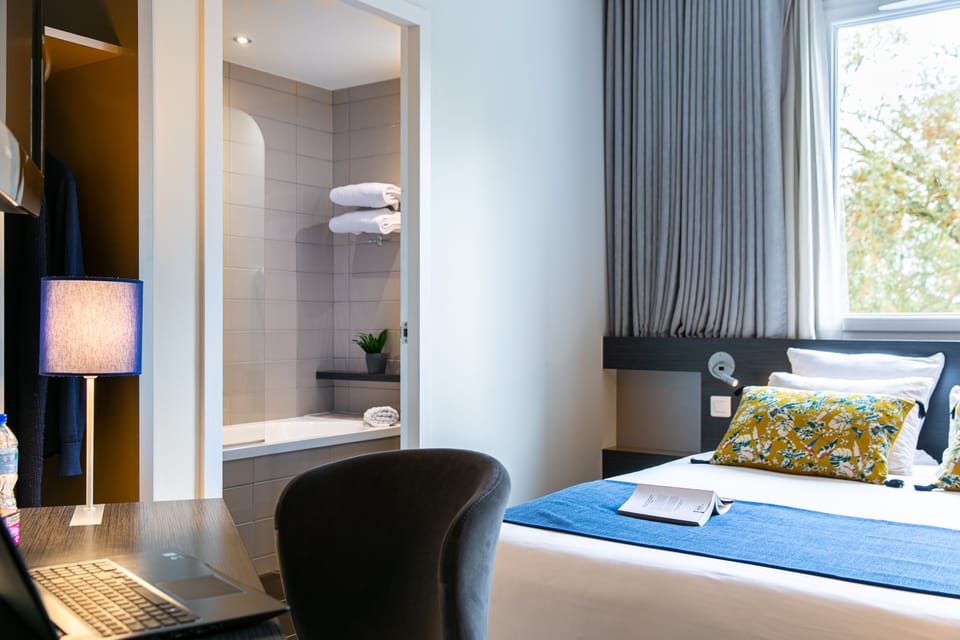 Superior Family Room | Premium bedding, blackout drapes, soundproofing, iron/ironing board