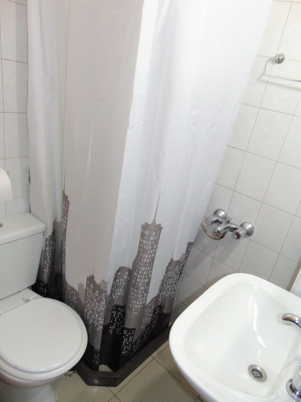 Apartment, City View (Parking) | Bathroom | Shower, rainfall showerhead, hair dryer, bidet