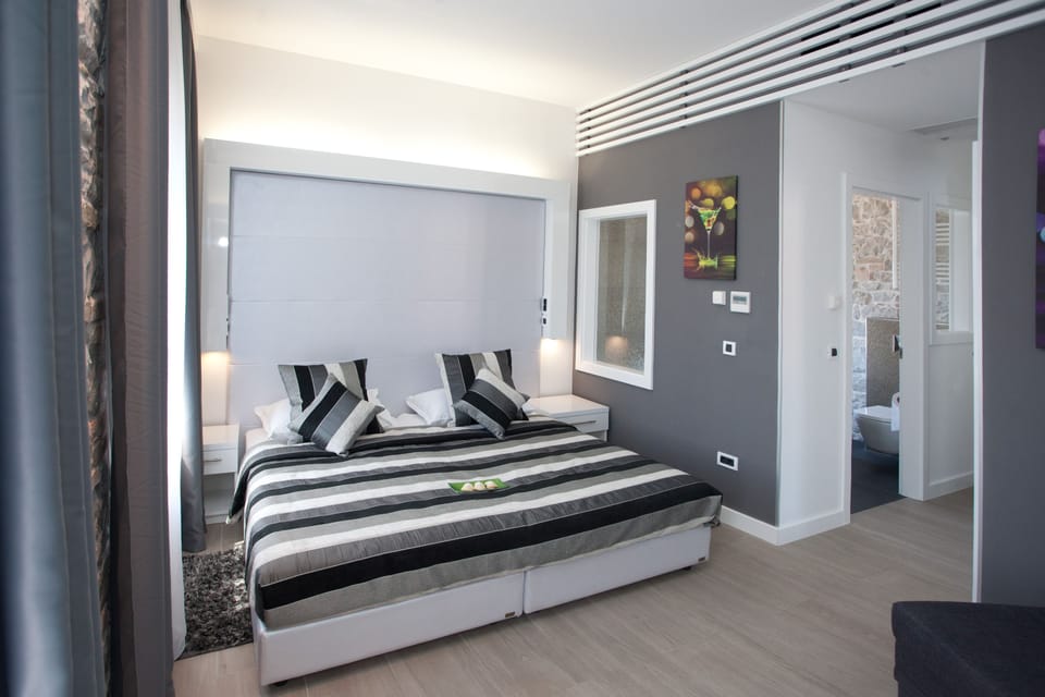 Premium bedding, minibar, in-room safe, individually decorated