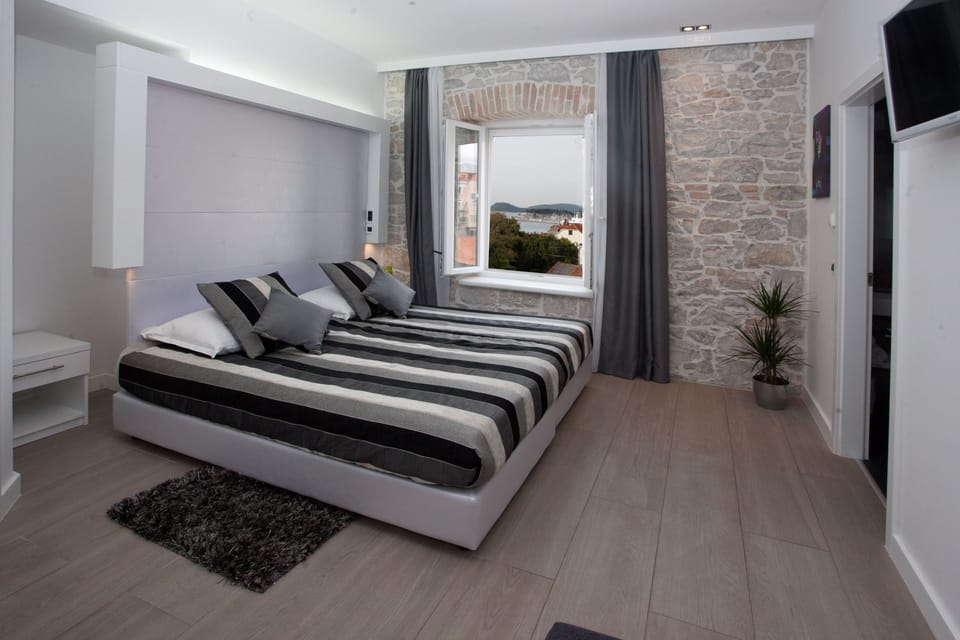Premium bedding, minibar, in-room safe, individually decorated