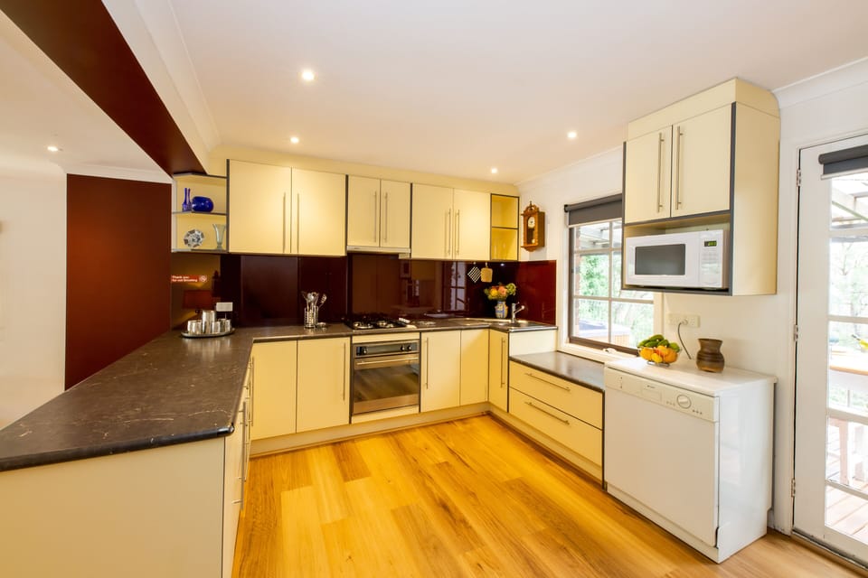 Luxury Cottage, 1 Bedroom, Jetted Tub | Private kitchen | Coffee/tea maker, electric kettle, toaster, cookware/dishes/utensils