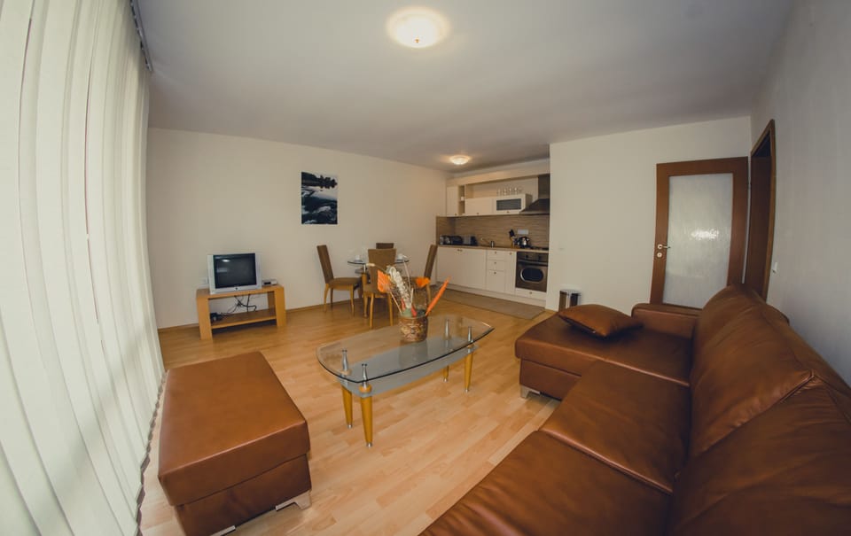 Apartment, 2 Bedrooms (Free WiFi & Parking) | Living area | 20-inch TV with digital channels