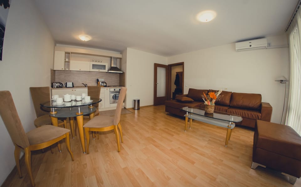 Apartment, 2 Bedrooms (Free WiFi & Parking) | Living area | 20-inch TV with digital channels