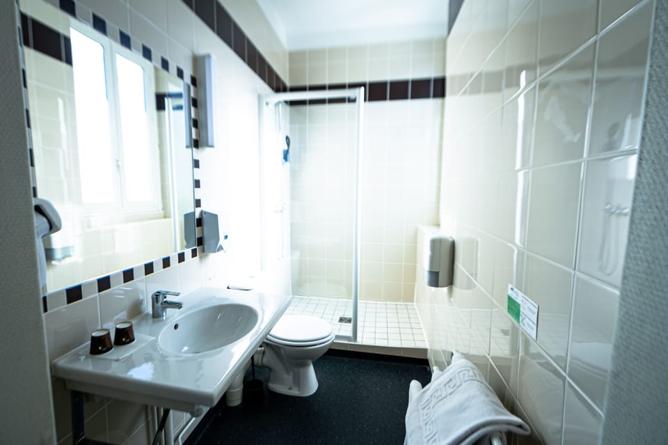 Shower, free toiletries, hair dryer, towels