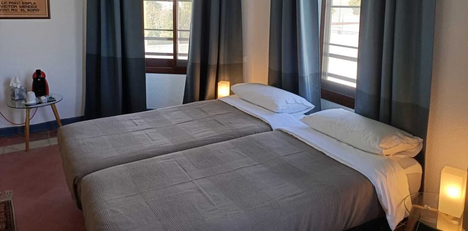 Blackout drapes, free WiFi, bed sheets