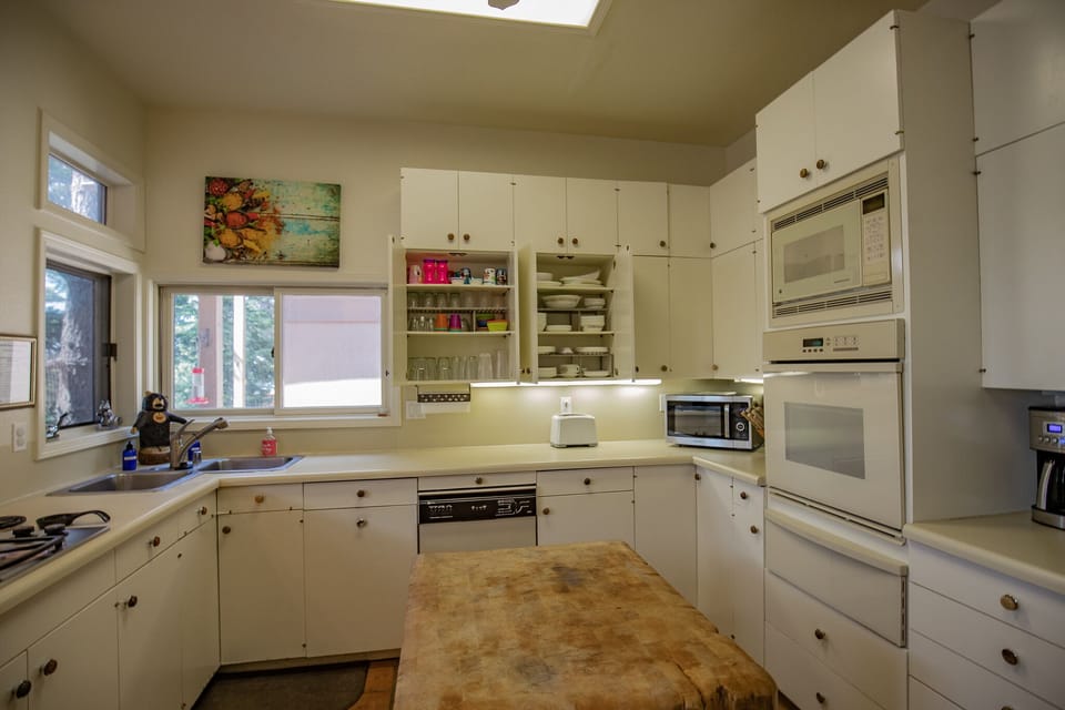 Gas range preferred by Chefs and ample dishware for all guests. 