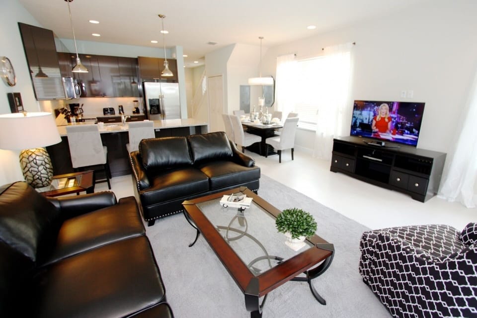 Living Area - View #2; Comfortable Leather Furniture and Flat Screen TV