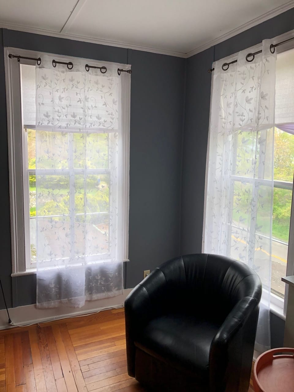 Living room with windows facing winter water view
