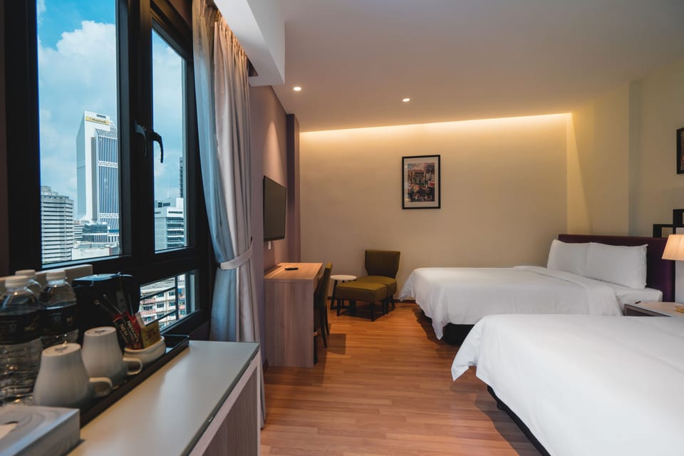Family Room, 2 Queen Beds, City View | In-room safe, blackout drapes, soundproofing
