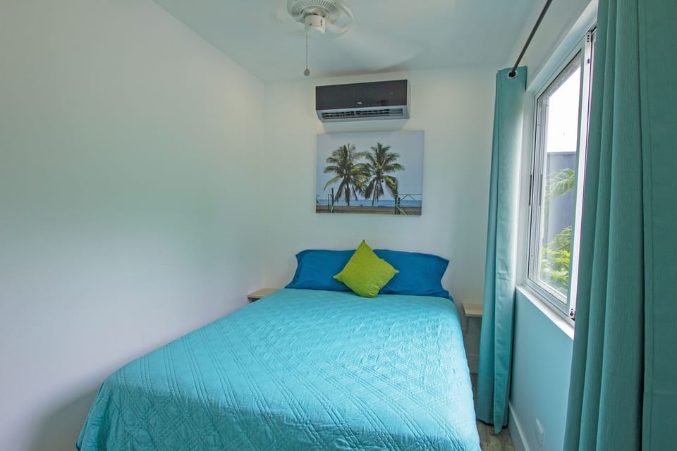 Our rentals have very comfortable queen sized beds paired with air conditioning