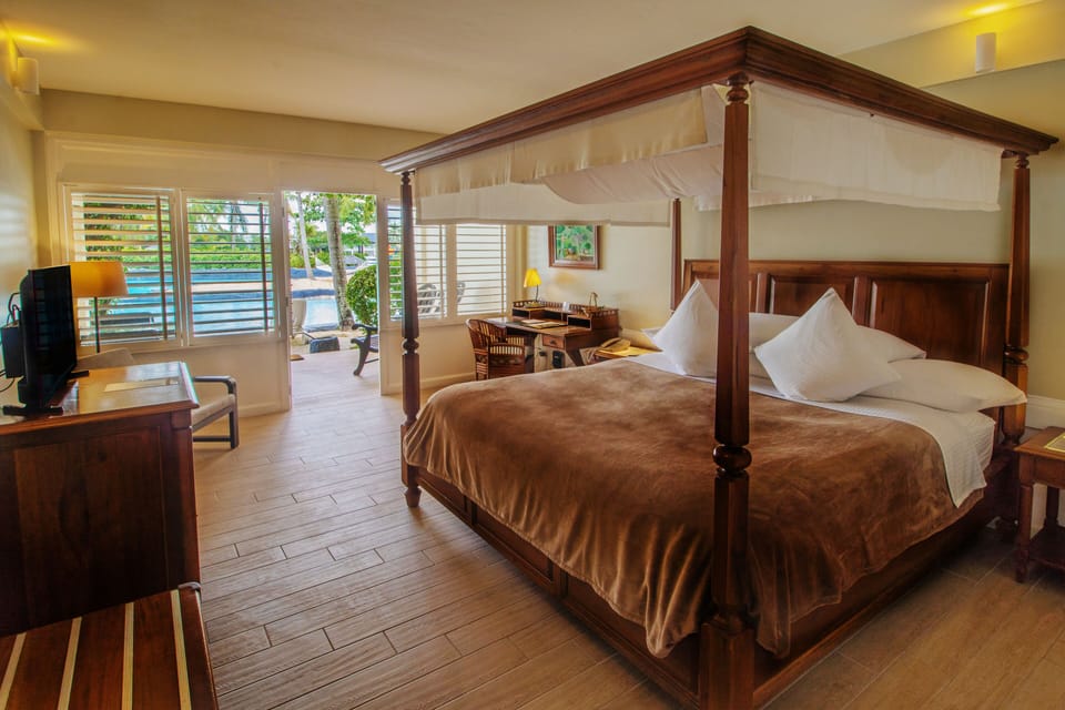 Ground-Floor Beachside Room | In-room safe, desk, laptop workspace, iron/ironing board