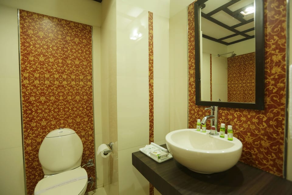 Shower, free toiletries, hair dryer, slippers