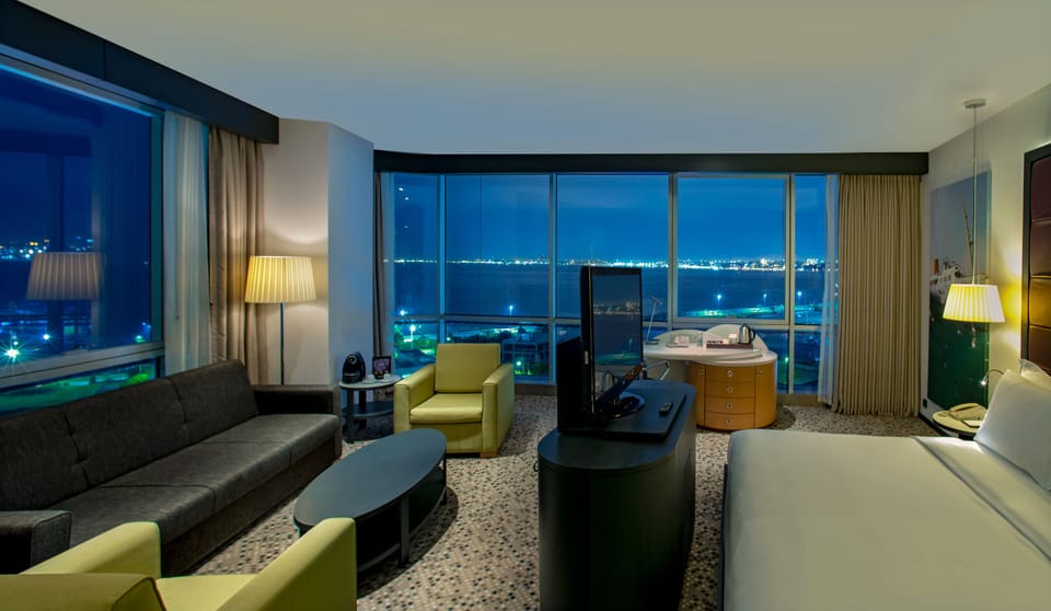 Junior Suite, 1 King Bed, Sea View | Premium bedding, in-room safe, laptop workspace, blackout drapes