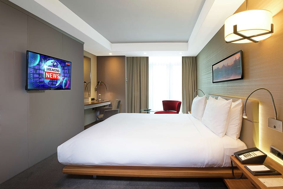 Suite, 1 King Bed (with Separate Living Room) | Premium bedding, minibar, in-room safe, desk