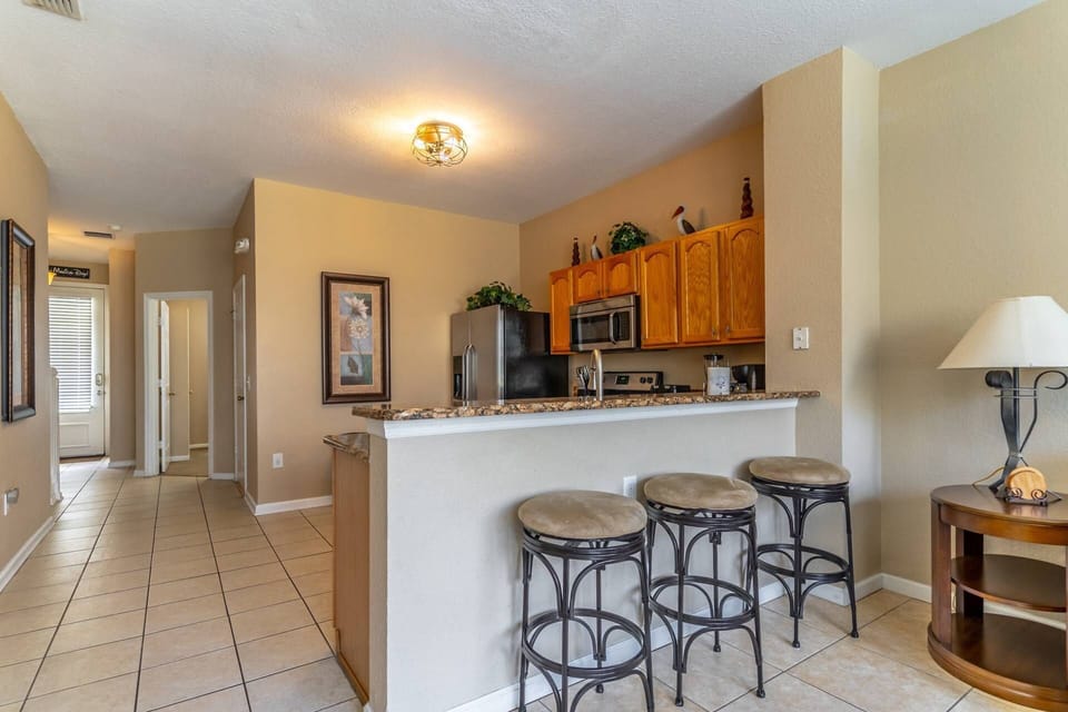 Large Kitchen Area With Breakfast Bar