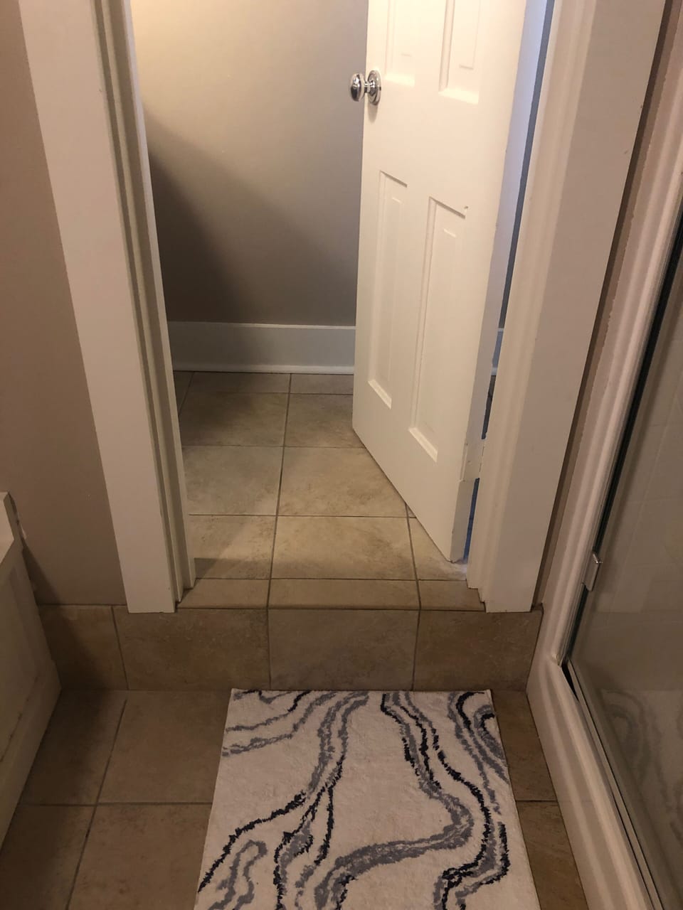 One step up to toilet / sink area