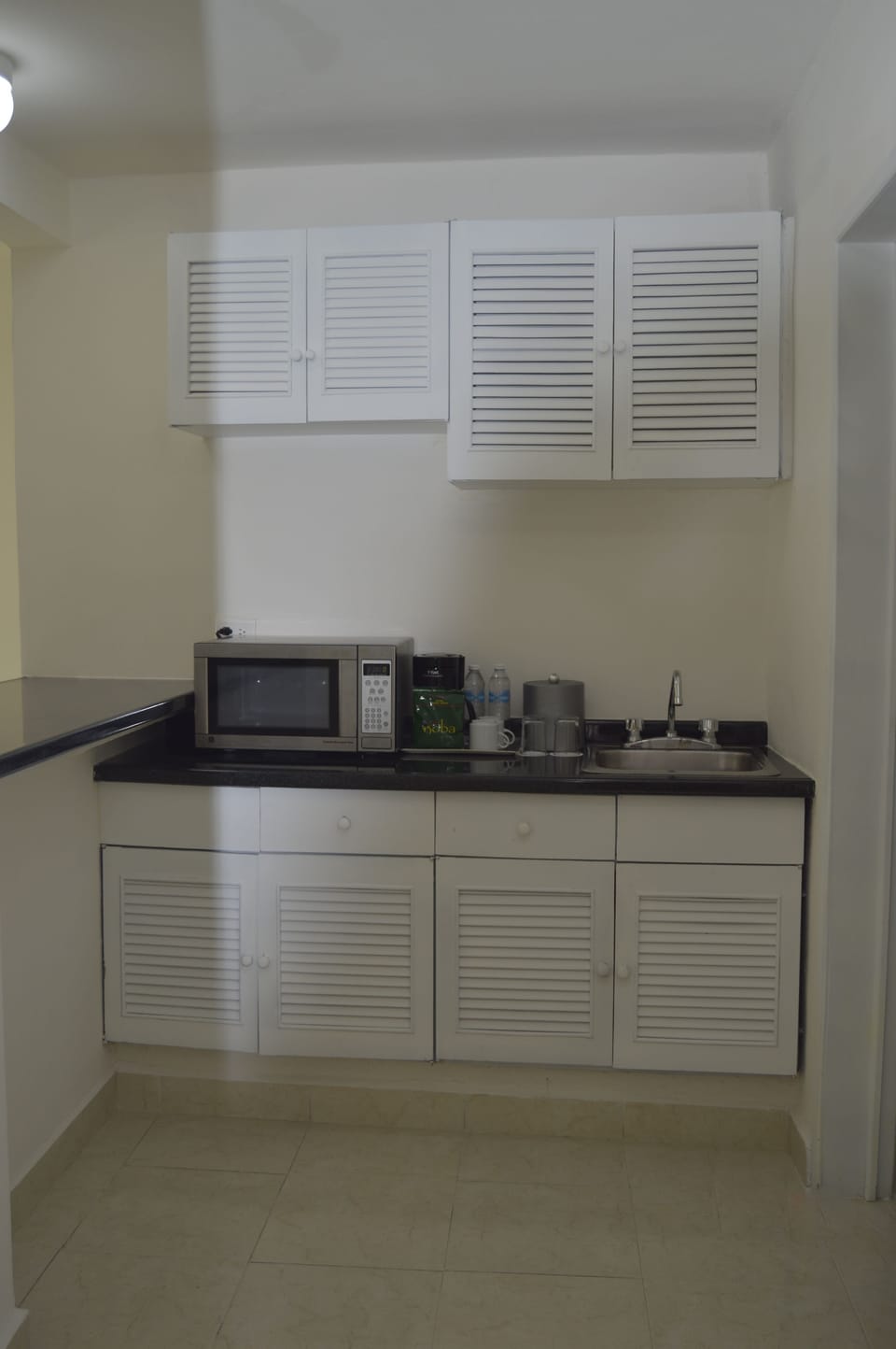 Master Suite Garden View | Private kitchenette | Coffee/tea maker, toaster, cookware/dishes/utensils, dining table