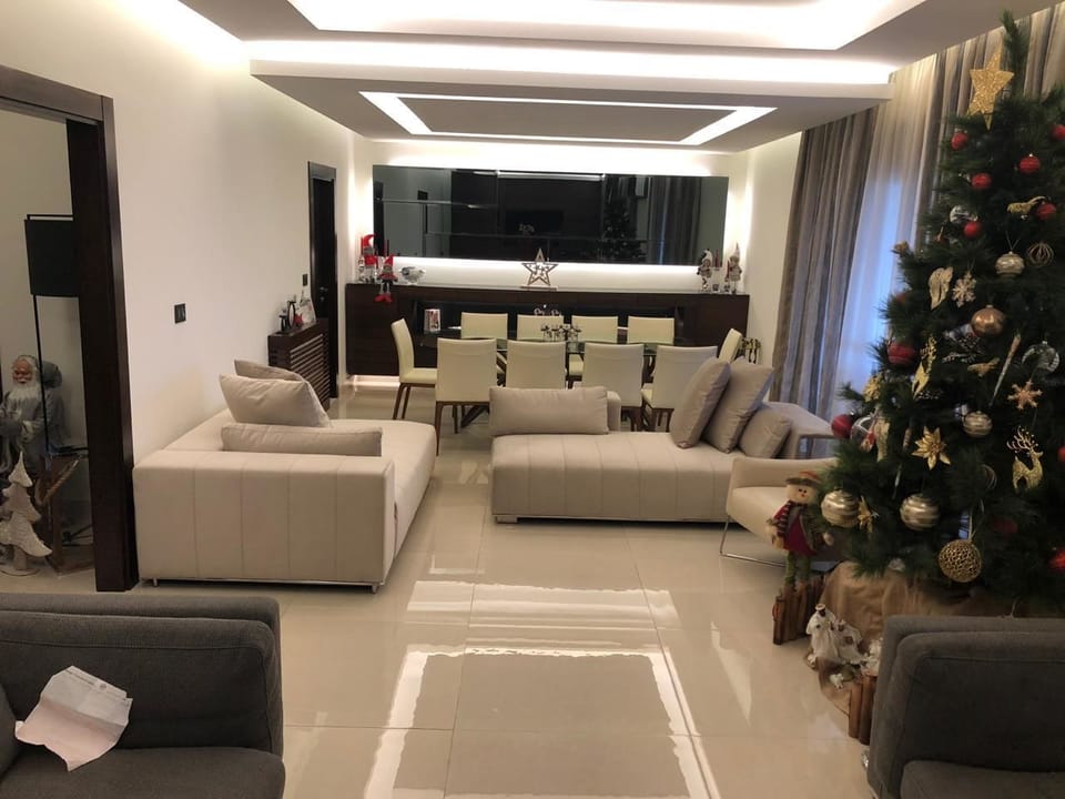 Apartment, 2 Bedrooms | Living area | 60-inch LED TV with satellite channels, TV
